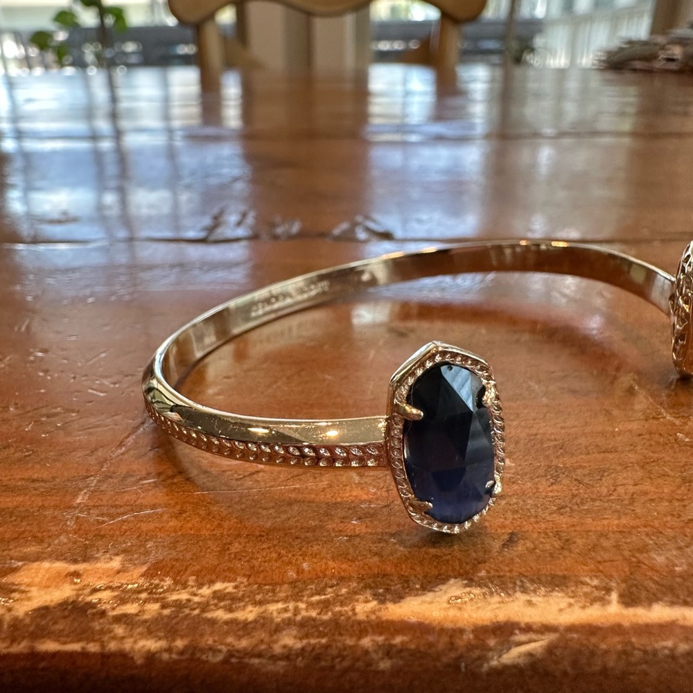 Kendra Scott navy cobalt cats eye Elton cuff bracelet with gold hardware